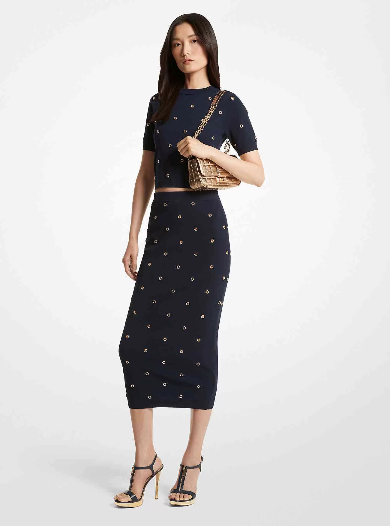 Bleistiftrock aus elastischem Strick mit Ösenverzierung