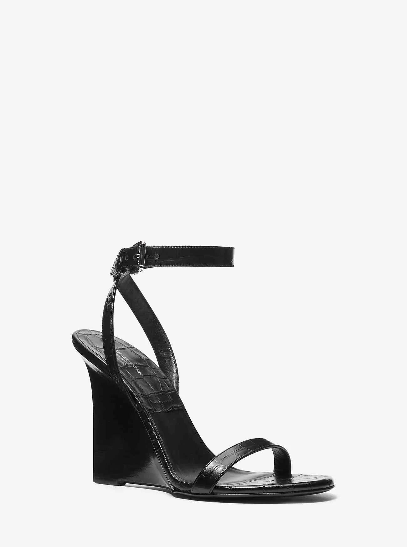 Claudia Keilsandalette aus Leder mit Krokodilprägung